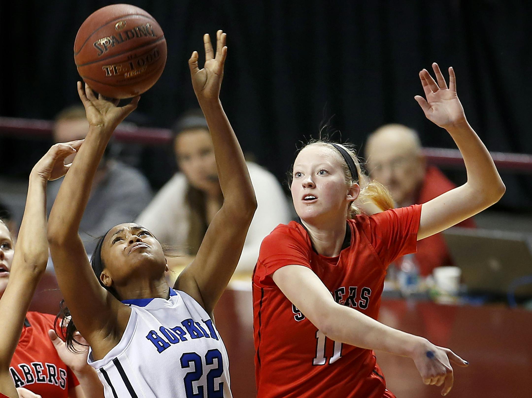 TT Starks (22) of Hopkins attempted a shot while being defended by Taylor Koenen (11) of Shakopee in the first half. ] CARLOS GONZALEZ cgonzalez@startribune.com, March 19, 2015, Minneapolis, Minn., 2015, Williams Arena, High School / Prep Girls Basketball, Class 4A semifinals, Hopkins vs. Shakopee