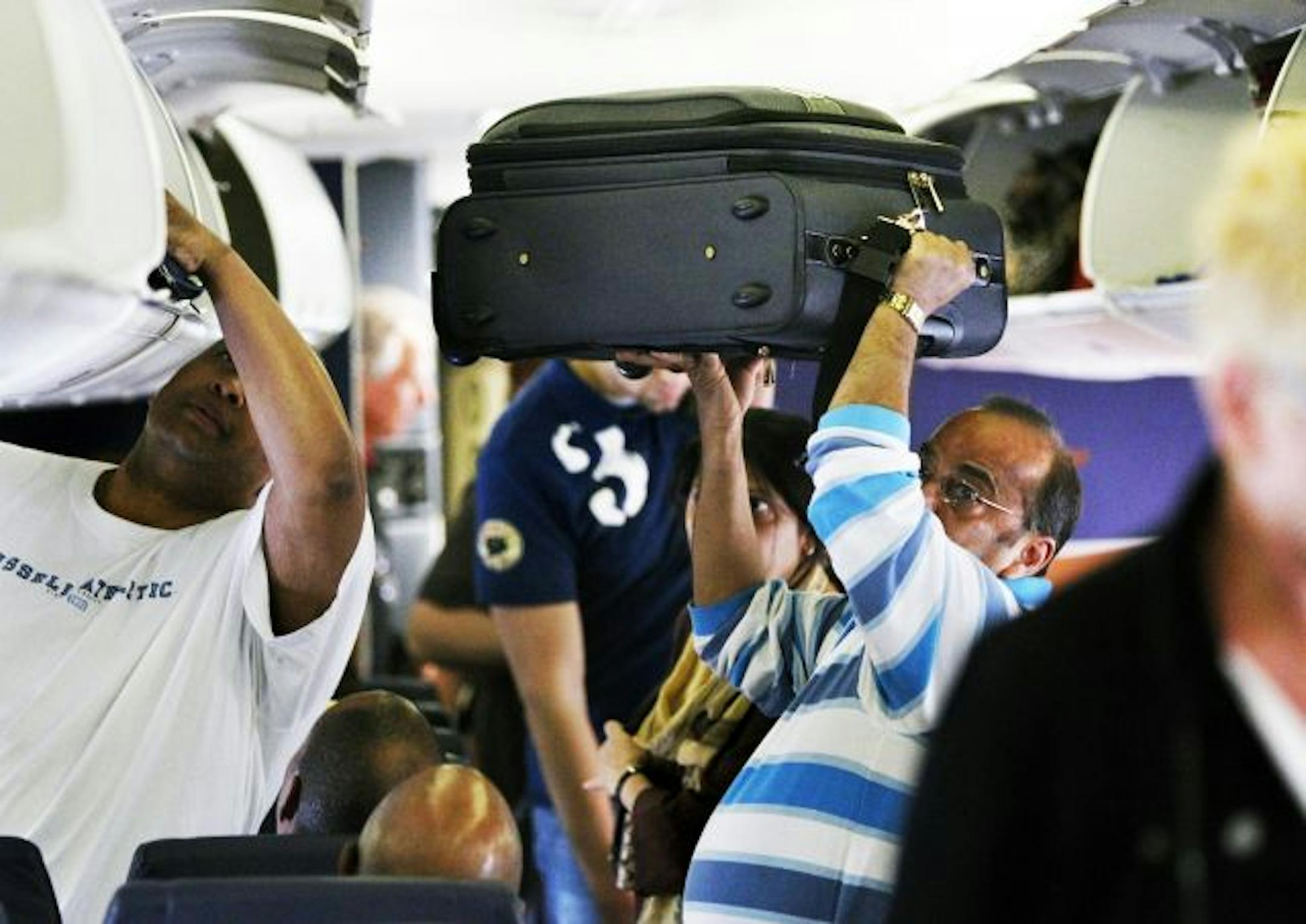In the age of fees for checked baggage, airline passengers know the challenge is to get their carry-on bag on board.