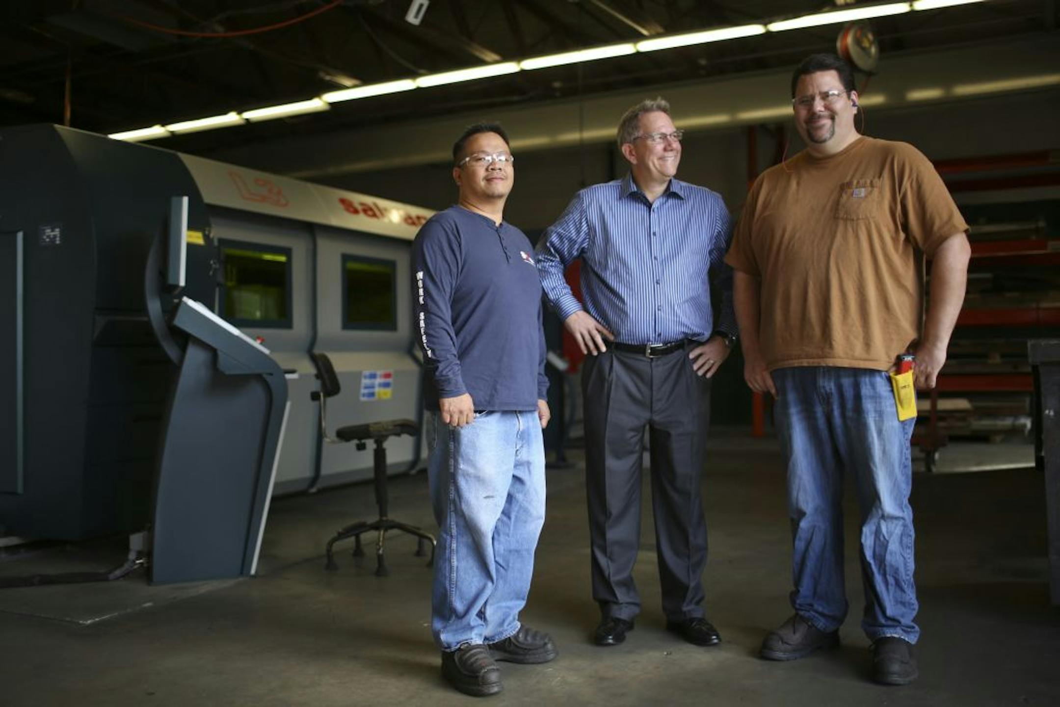 E.J. Ajax & Sons, the Fridley metal stamper and steel fabricator supports a fairly new and innovative Hennepin Technical College program that provides up to 32 hours "soft-skills" training for line employees who are candidates for floor-management jobs. Ajax is adding jobs and production and likes to promote from within. Anthony Krump and Neng Yang are Ajax employees who went through the class recently. Neng Yang, left, 2nd shift supervisor, with Anthony Krump, team leader, right, and Ajax owner