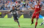 Minnesota United midfielder Miguel Ibarra, left, celebrates his first-half goal against Toronto FC on Wednesday, July 4, 2018, at TCF Bank Stadium in 