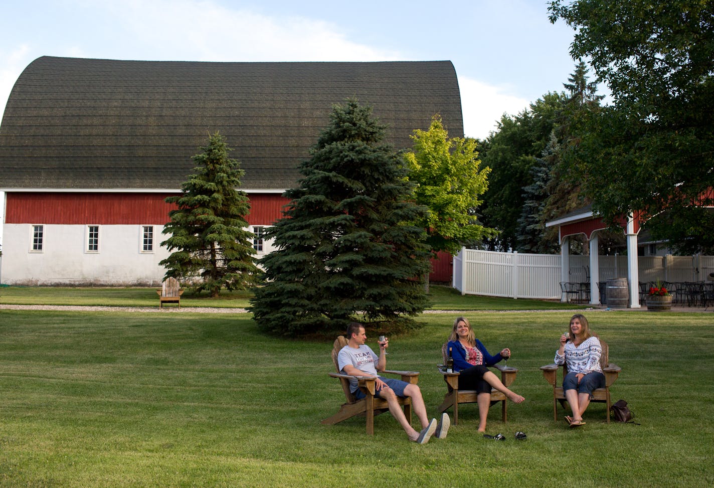 Jeff and Liz Marciniak and Erica Gough enjoyed a bottle of spicy Hunters Red at Woodland Hill Winery in Delano. The winery features a charming gazebo and pastoral views.