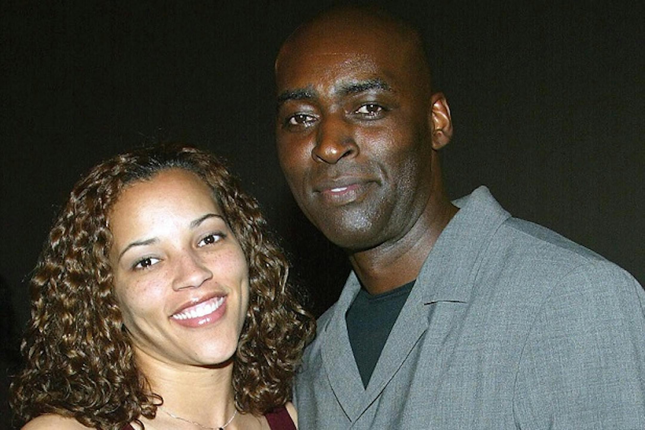 Actor Michael Jace (R) and April Jace attend the third season premiere screening of "The Shield" at the Zanuck Theater on March 8, 2004 in Los Angeles, California.