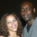 Actor Michael Jace (R) and April Jace attend the third season premiere screening of "The Shield" at the Zanuck Theater on March 8, 2004 in Los Angeles