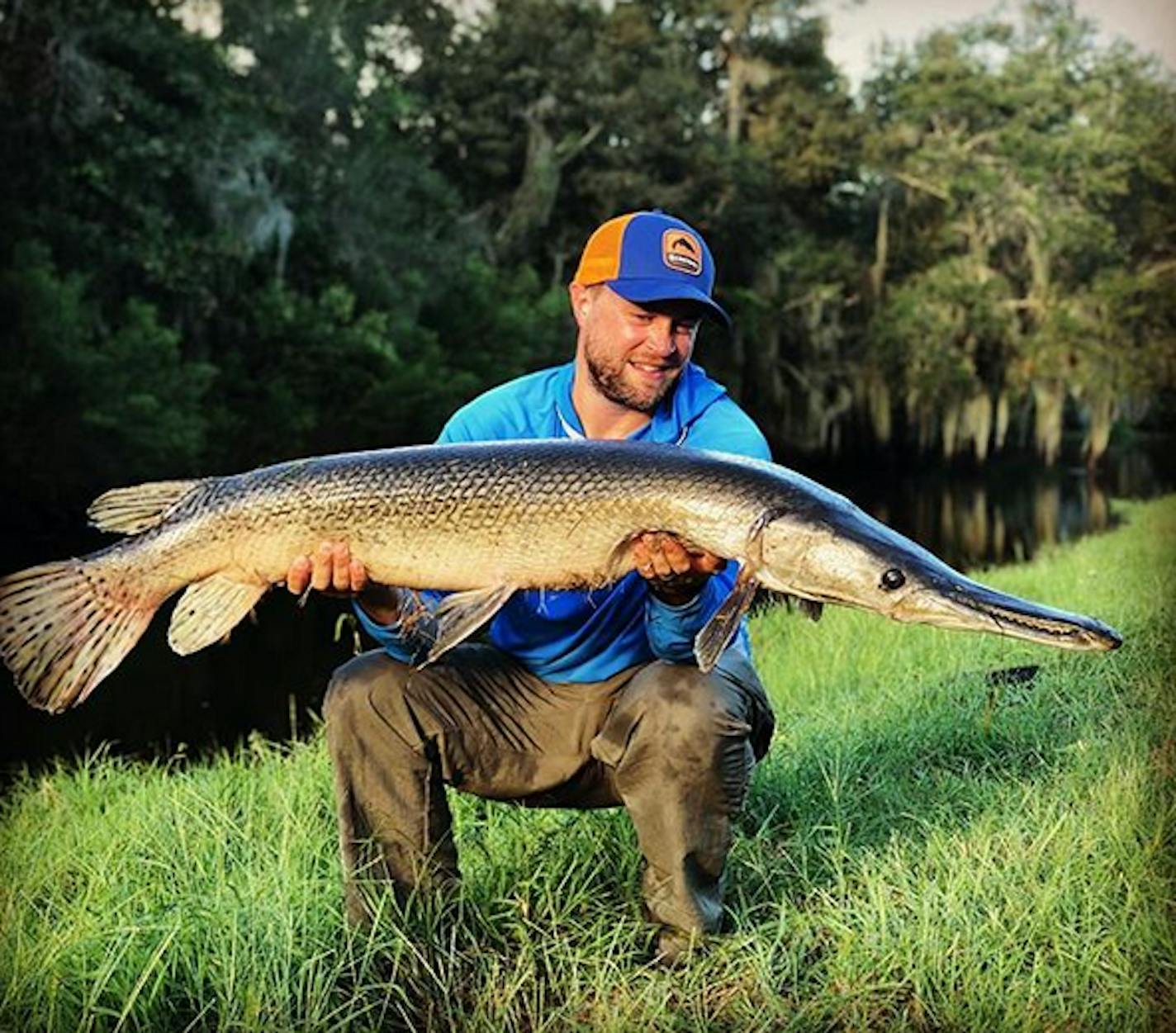 Justin Watkins with a longnosed gar.