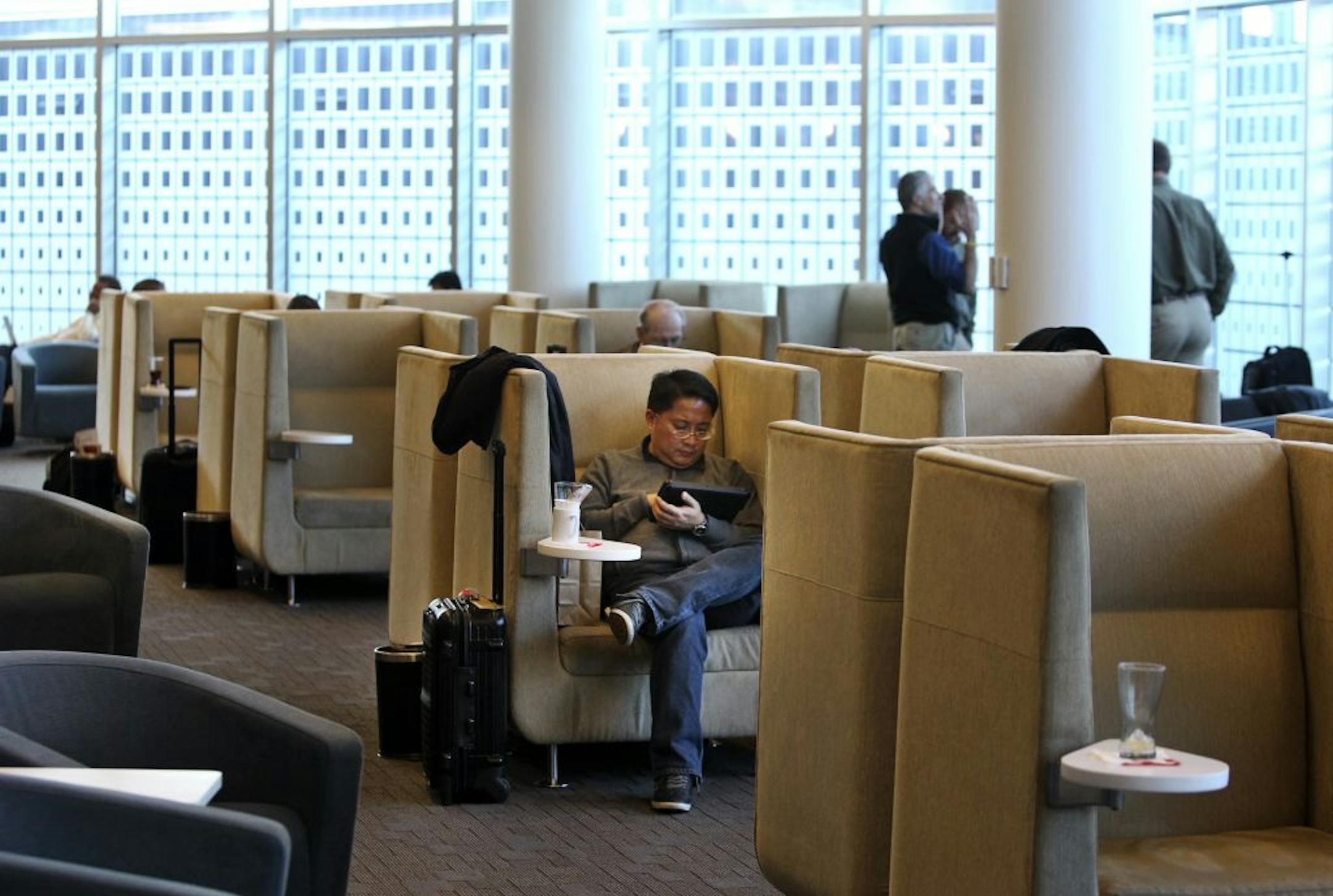 Passengers get complimentary Wi-Fi and other amenities at the Delta Sky Club at the Minneapolis-St. Paul Airport.