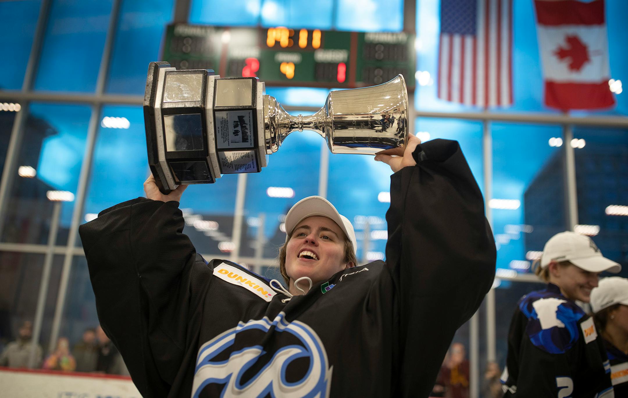 Whitecaps goaltender Amanda Leveille celebrates with the Isobel Cup at Tria Rink after Minnesota beat the Buffalo Beauts 2-1 in overtime to win the NWHL Championship.