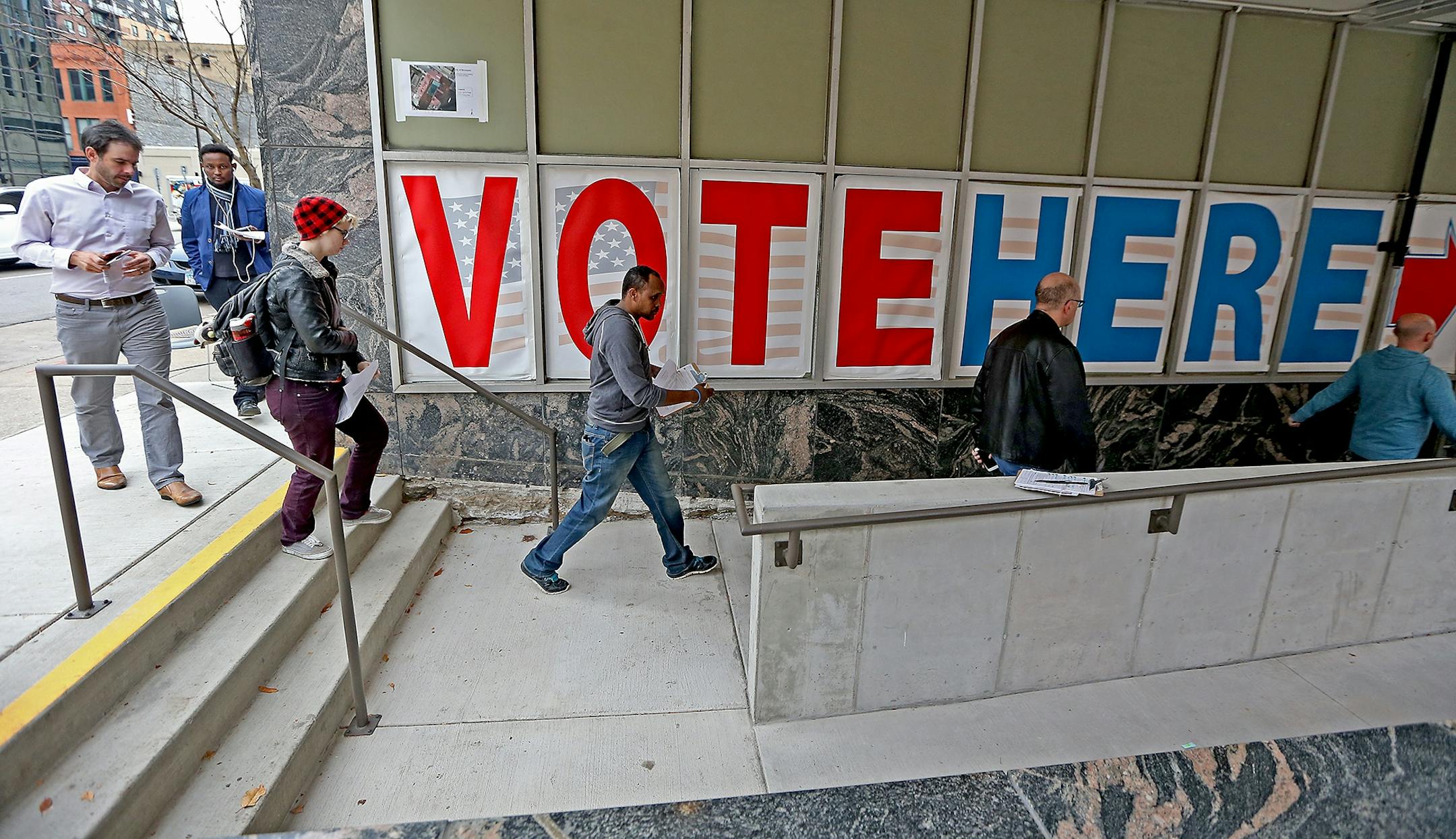 Voters made their way into the Community Services Building at 217 South Third Street during the last day to vote early, Monday, November 7, 2016 in Minneapolis, MN. Wait times were expected at 45 minutes.