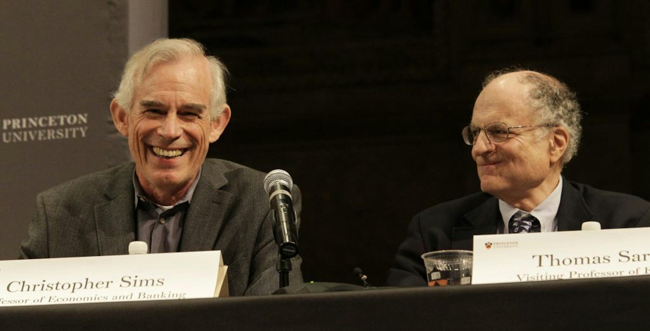Christopher Sims, left, and Thomas Sargent talk about winning the Nobel Prize for economics during a news conference on Monday, Oct. 10, 2011, at Princeton University in Princeton, N.J. Their research sheds light on the cause-and-effect relationship between the economy and policy instruments such as interest rates and government spending.