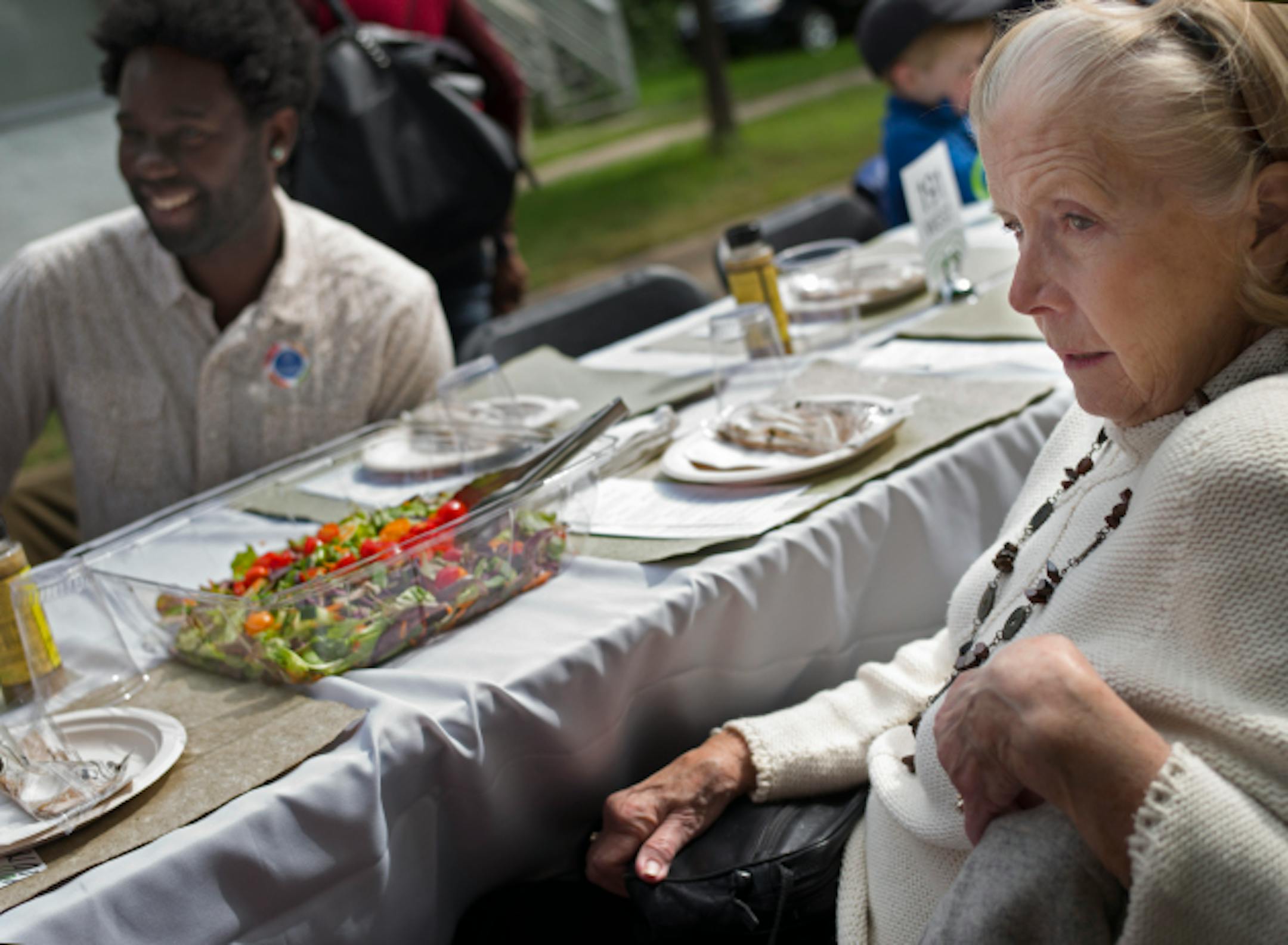 The dinner table was the gathering place Sunday on Victoria Street in St. Paul. A half-mile dinner table, at that, which ran down the middle of the street between University and Minnehaha avenues as part of a project called "Create: The Community Meal."