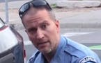 Video filed by a bystander shows a Minneapolis police officer identified as Derek Chauvin with his knee on the neck of George Floyd. Floyd later died.