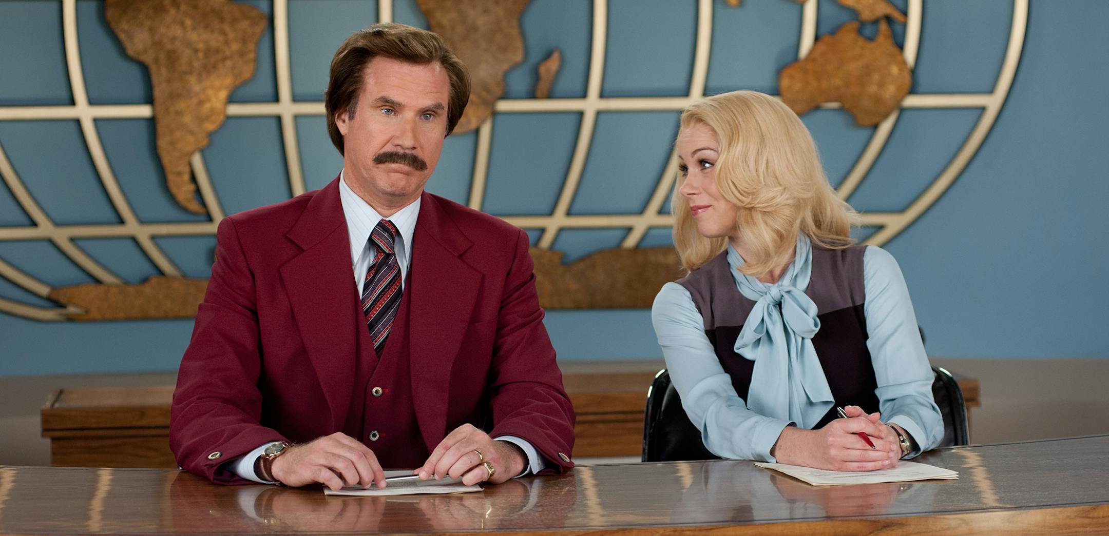 This image released by Paramount Pictures shows Will Ferrell as Ron Burgundy, left, and Christina Applegate as Veronica Corningstone in a scene from "Anchorman 2: The Legend Continues." (AP Photo/Paramount Pictures, Gemma LaMana) ORG XMIT: MIN2013121814102350