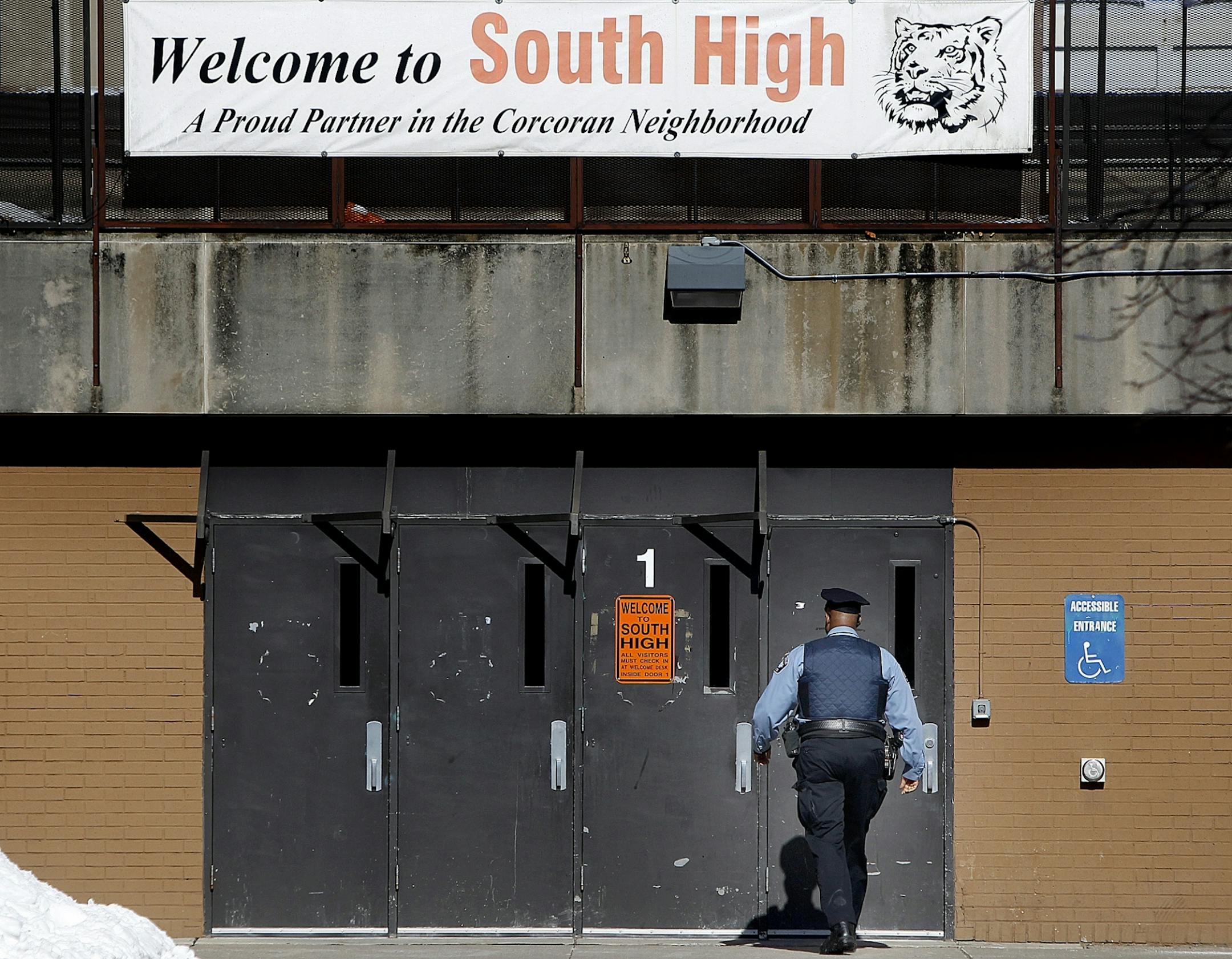 There was evidence of more police presence on the grounds of South High School on Friday, a day after a fight involving hundreds of students broke out over simmering tensions between Somali, African-American and white students at the Minneapolis school. Students said trouble had been brewing.