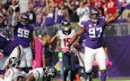 Minnesota Vikings' Everson Griffen celebrates a sack in the secnd quarter against the Houston Texans, but was called off sides and was penalized on th