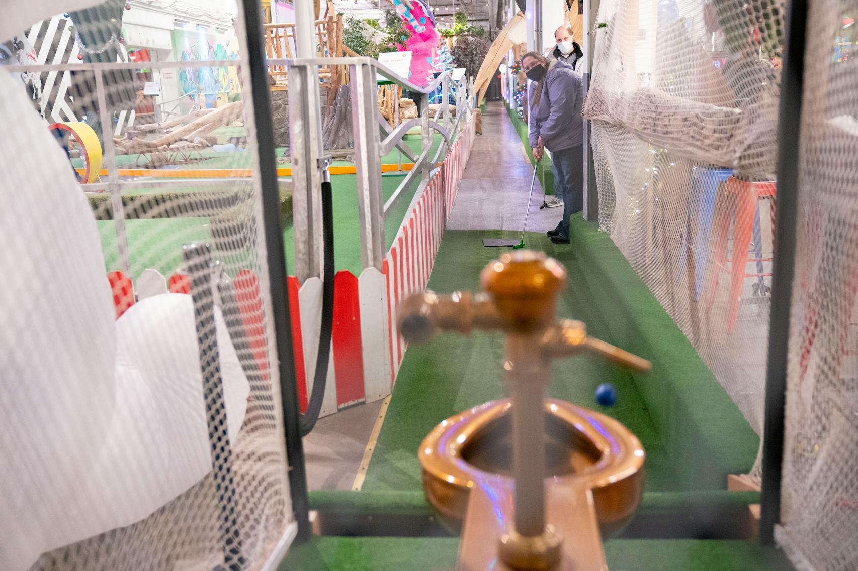 Mini golfing isn’t just for summer fun. Can Can Wonderland in St. Paul has an 18-hole course.
