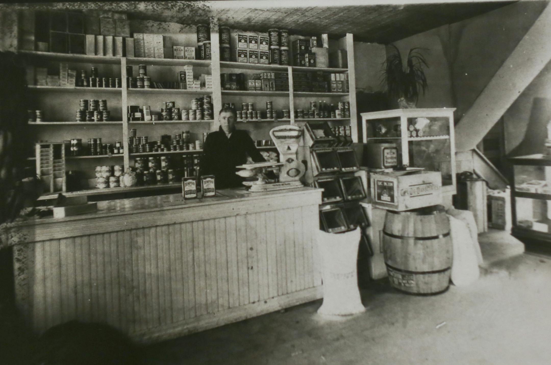 Iver Soderquist pictured in the first Soderquist's grocery store. Not sure the date on this photo.