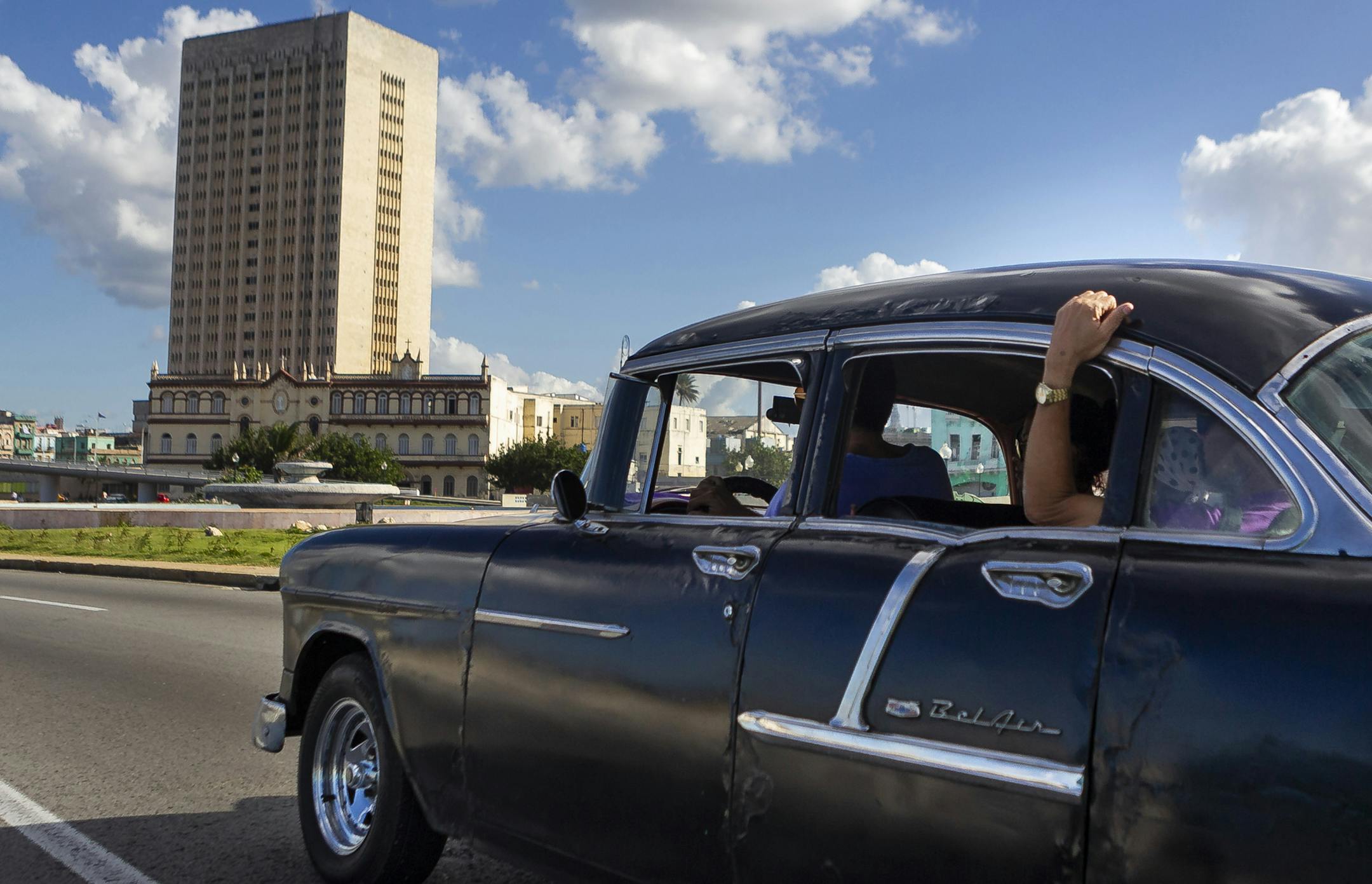 A vintage Belair heads toward the Hermanos Ameijeiras Hospital in Havana.