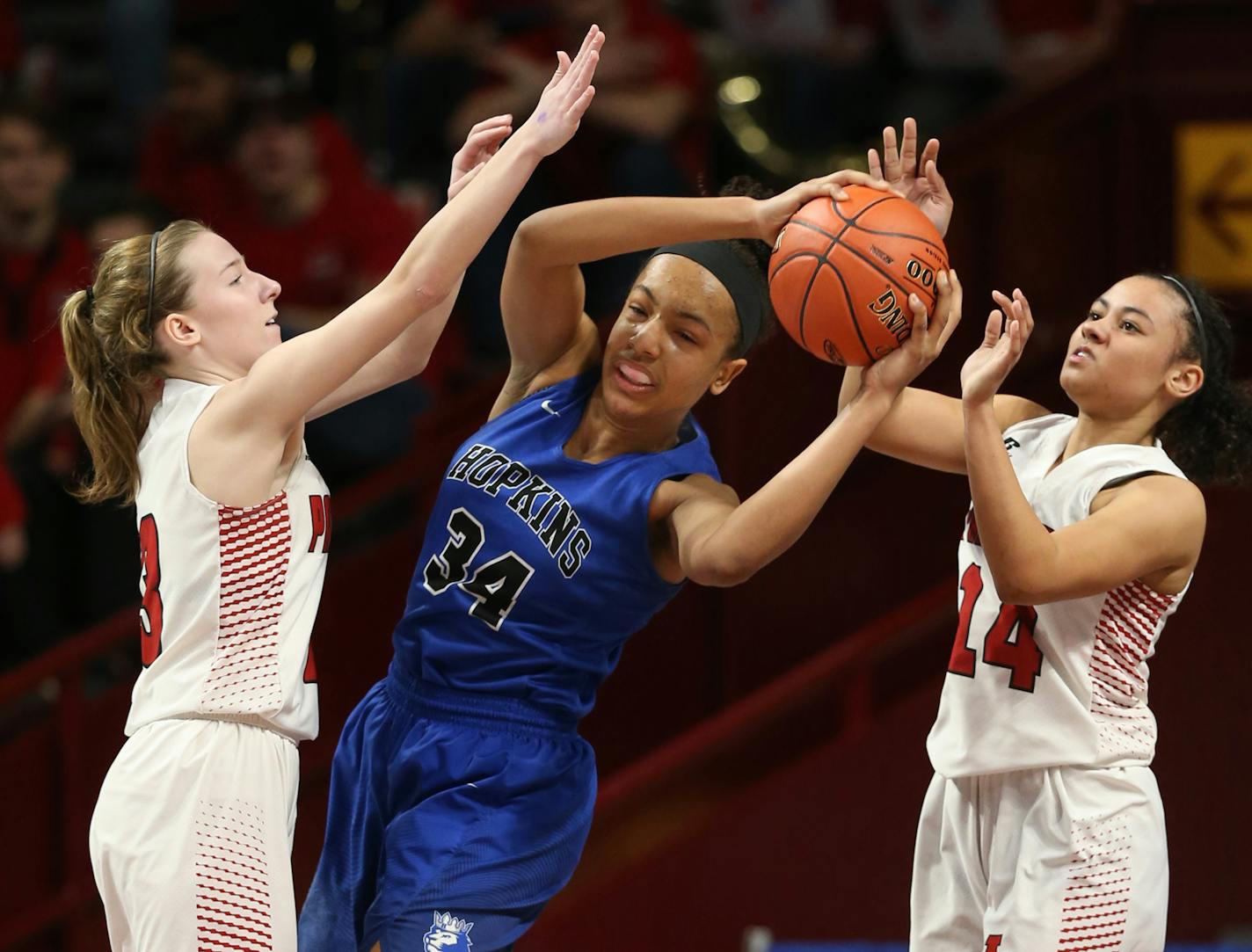 Maya Nnaji(34) of Hopkins tries to break the press from Abby Ruhland(13) and Sarah Kuma(14). ] Hopkins takes on Lakeville North in the quaterfinals of 4A girls basketball tourney at Williams Arena. RICHARD TSONG-TAATARII • richard.tsong-taatarii@startribune.com