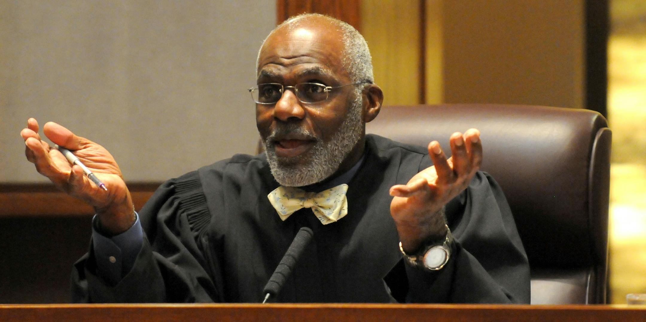 Supreme Court Justice Alan Page asks a question of attorney Erick Kaardal as the Minnesota Supreme Court heard oral arguments challenging the Secretary of State and Attorney General changing the titles of constitutional amendment questions headed for the voters on Tuesday morning, July 31, 2012.