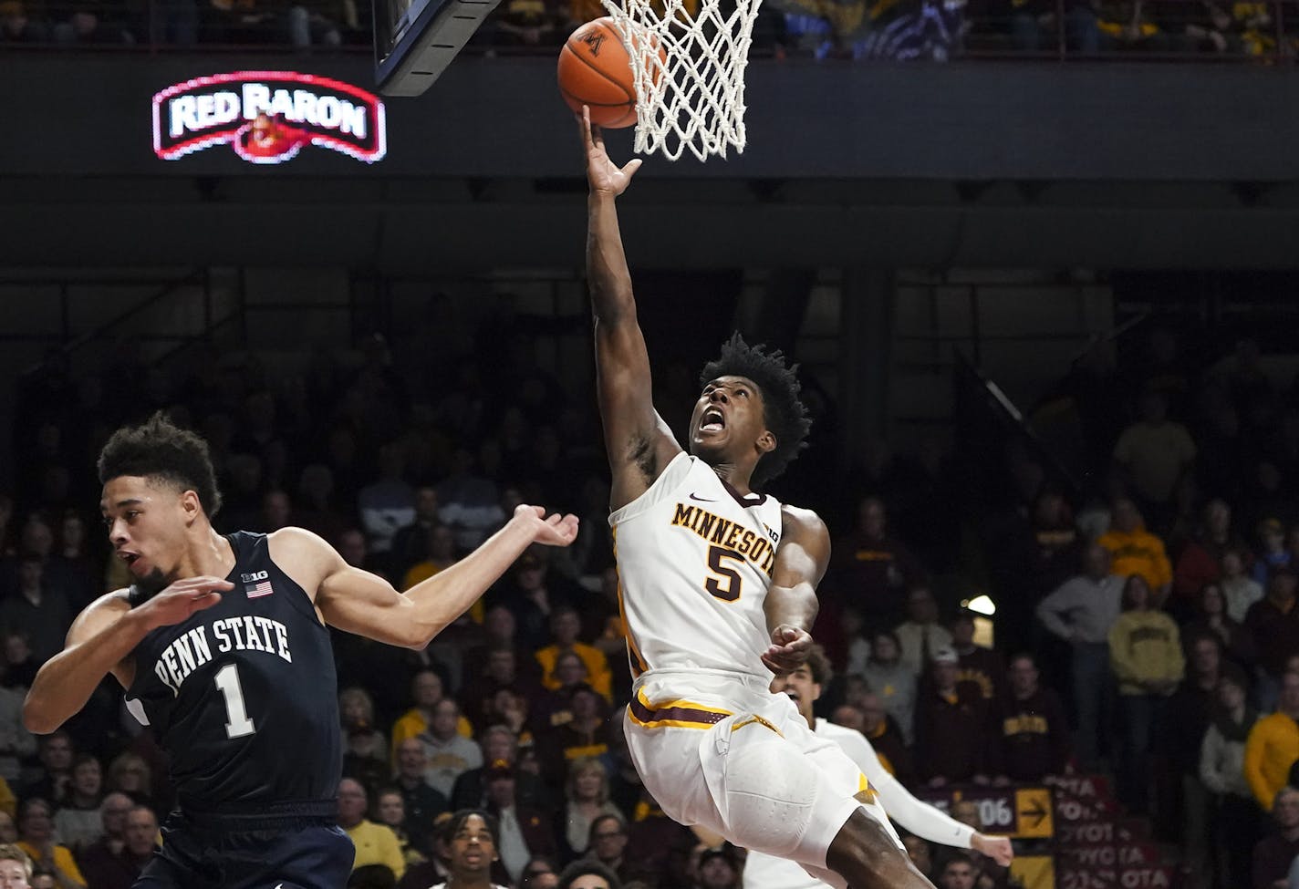 Minnesota's Marcus Carr (5) leaps for a wild shot in the final minutes of the second half against Penn State at Williams Arena in Minneapolis on Wednesday, Jan. 15, 2020. The host Golden Gophers won, 75-69. (Renee Jones Schneider/Minneapolis Star Tribune/TNS) ORG XMIT: MIN2001152356202002