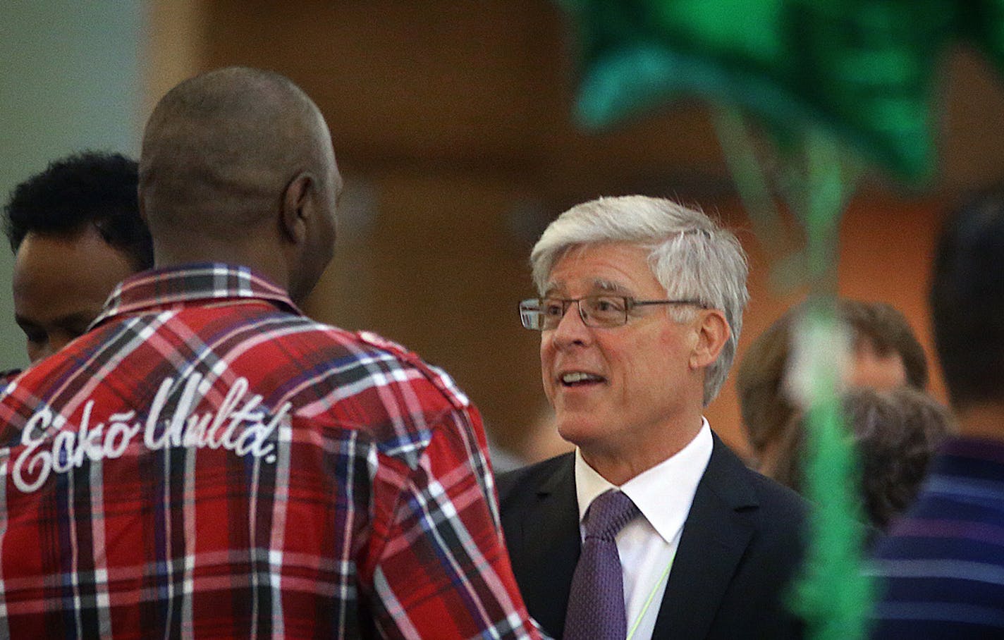 Mayoral candidate Mark Andrew greeted delegates and others during a break at the convention.