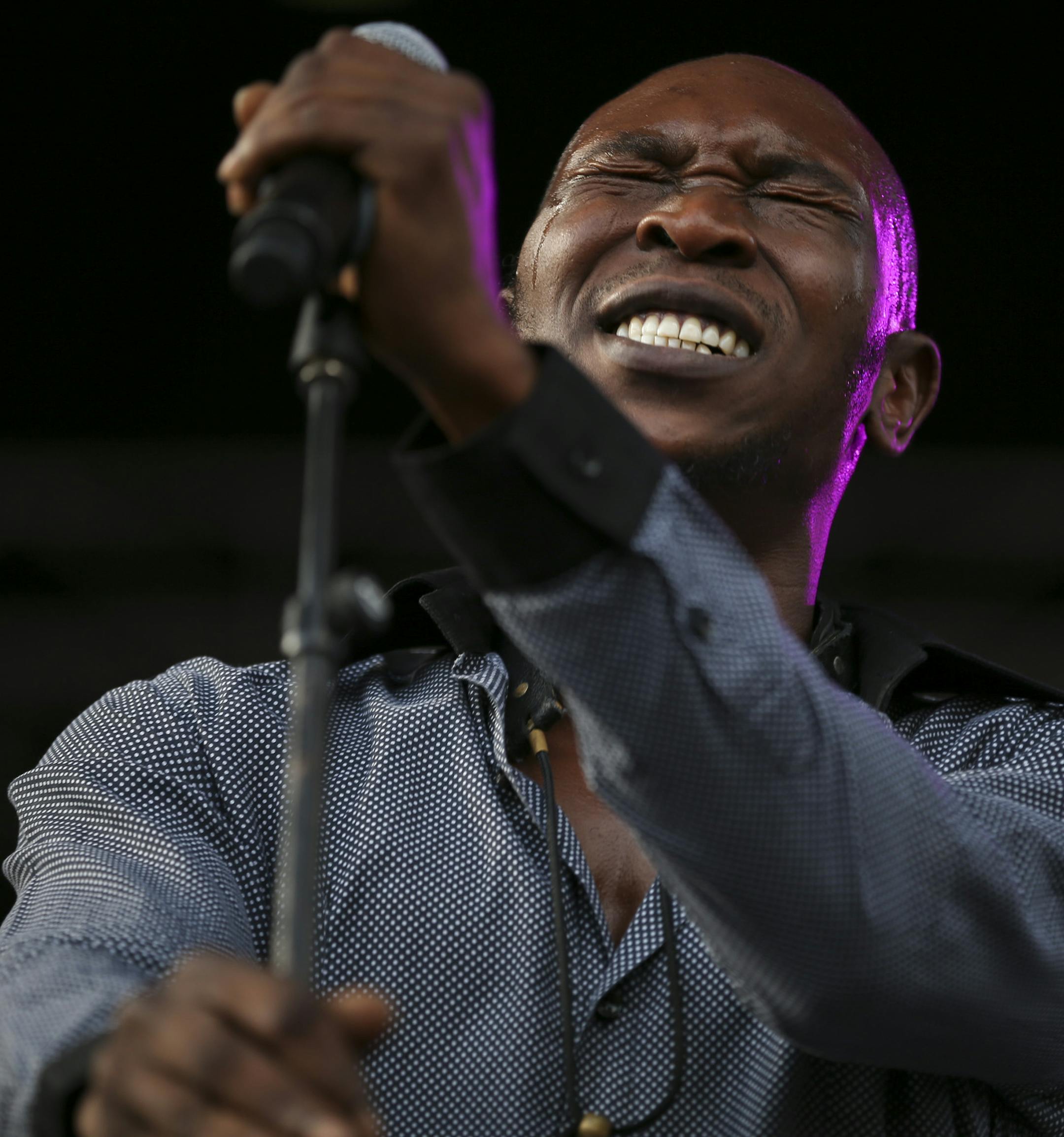 Seun Kuti & Egypt 80 early in their set Sunday, June 21, 2015, at Rock the Garden in Minneapolis. (Jeff Wheeler/Star Tribune via AP)