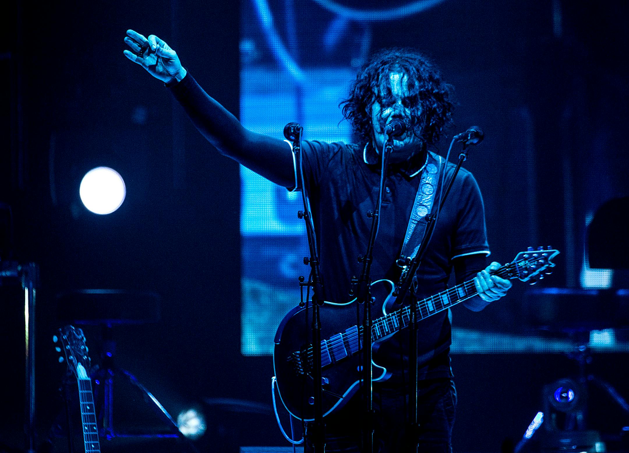 Jack White waves to the crowd as he sings his opening songs.