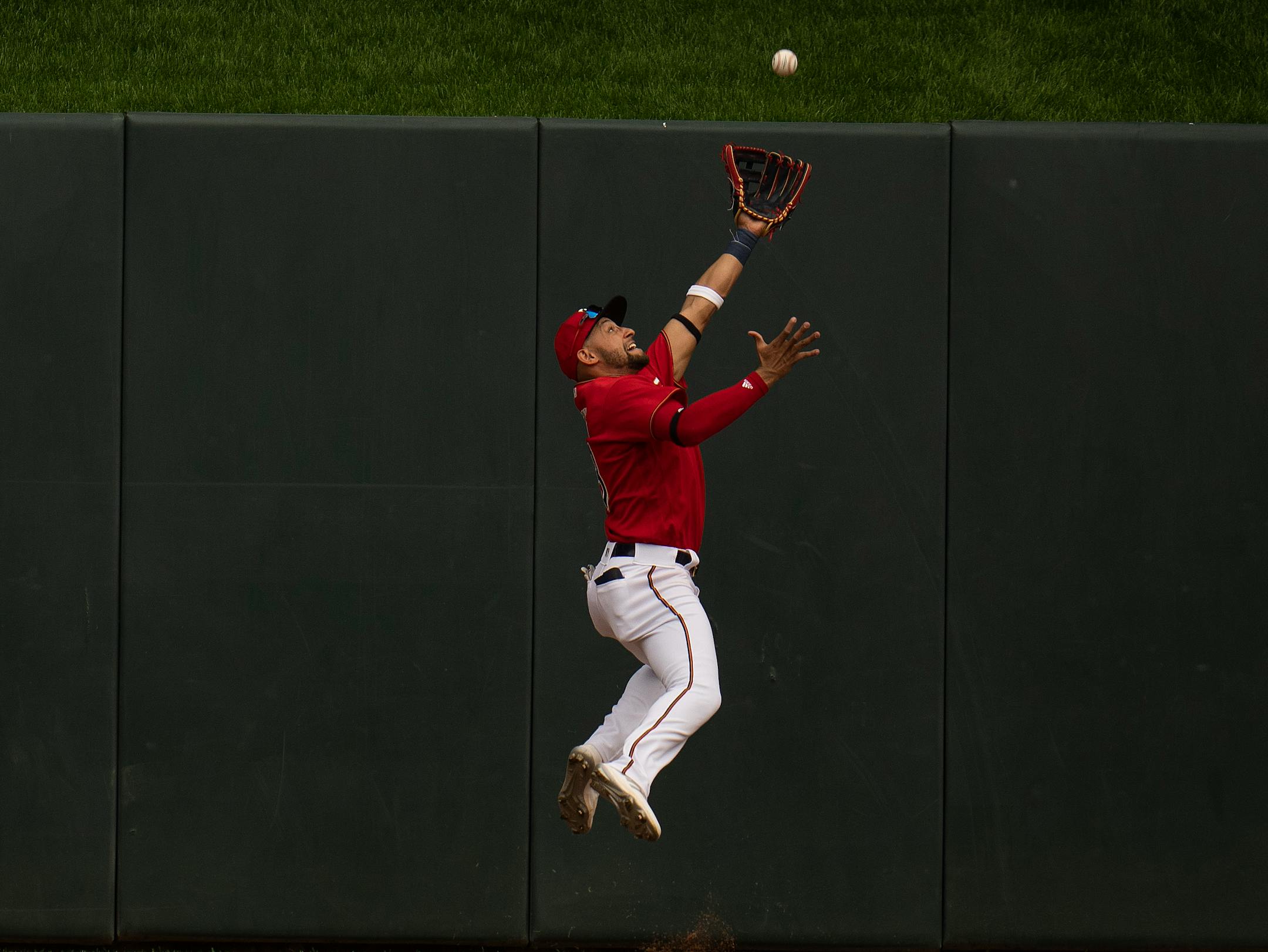 Twins centerfielder Royce Lewis snagged a fly ball hit by Kansas City Royals third baseman Emmanuel Rivera (26) in the sixth inning.