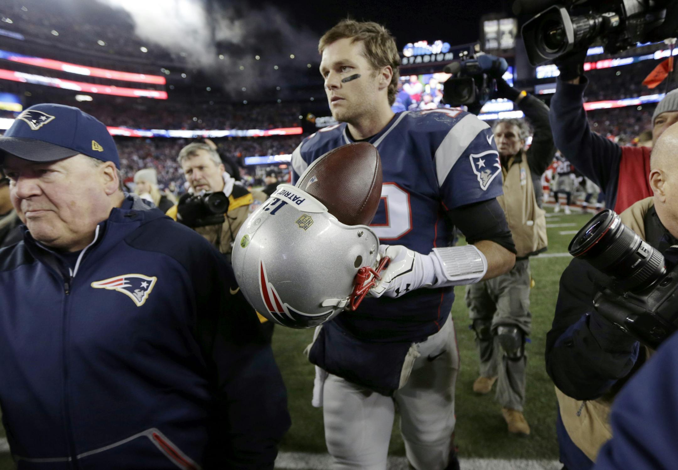 New England Patriots quarterback Tom Brady (12) leaves the field after an NFL divisional playoff football game against the Kansas City Chiefs, Saturday, Jan. 16, 2016, in Foxborough, Mass. The Patriots won 27-20. (AP Photo/Charles Krupa)