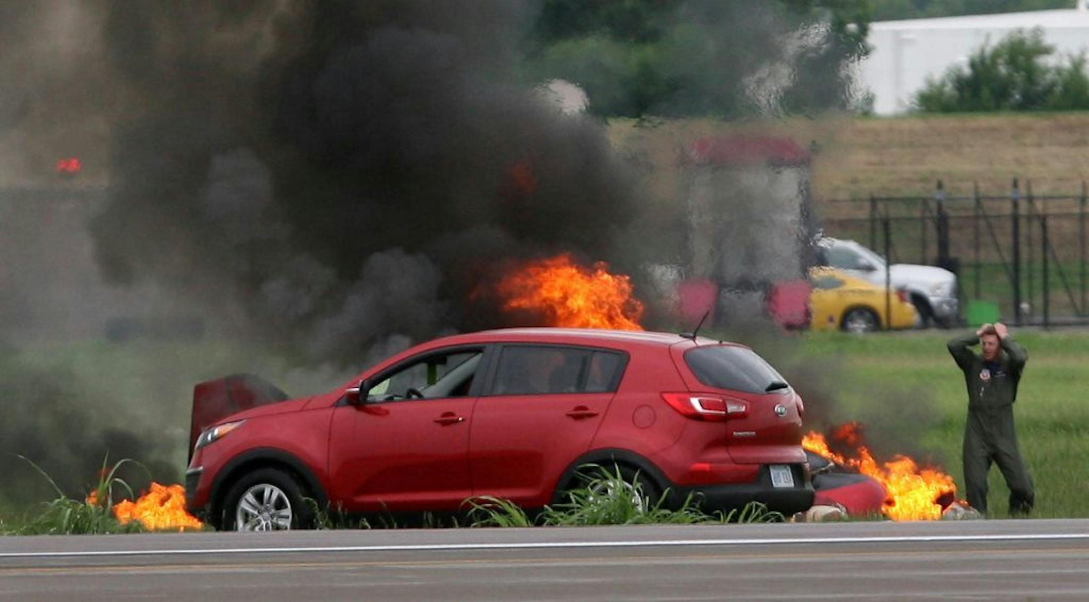 Stunt pilot Bryan D. Jensen died after his biplane, "The Beast," failed to pull out of a dive and crashed into a fiery ball on the grass next to a runway at Wheeler Downtown Airport.