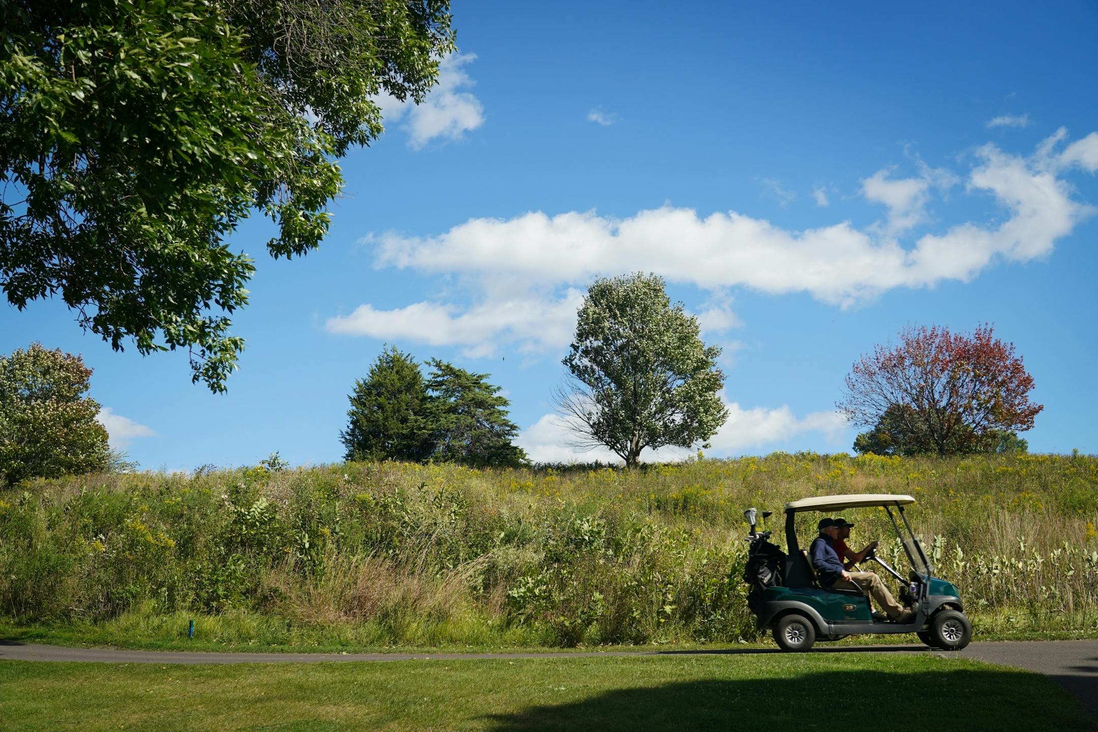 Golfers endured a windy day to get out on the links at Keller Golf Course in Maplewood.