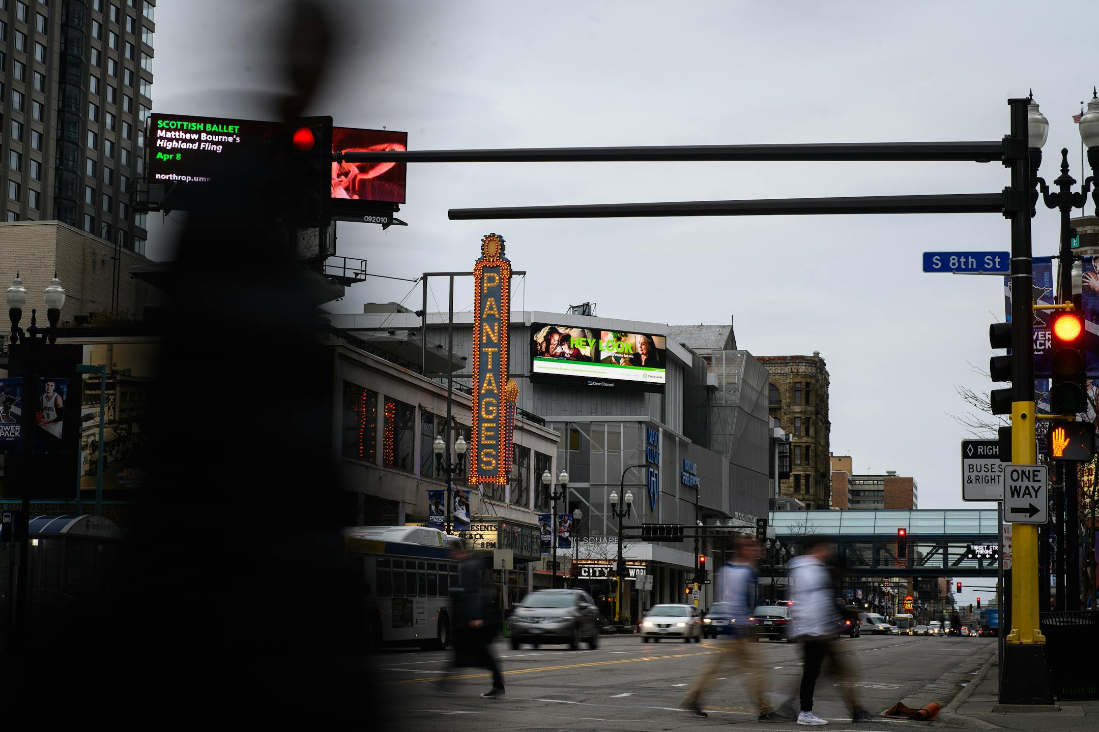 Pedestrians crossed the street at 8th Street and Hennepin Avenue.