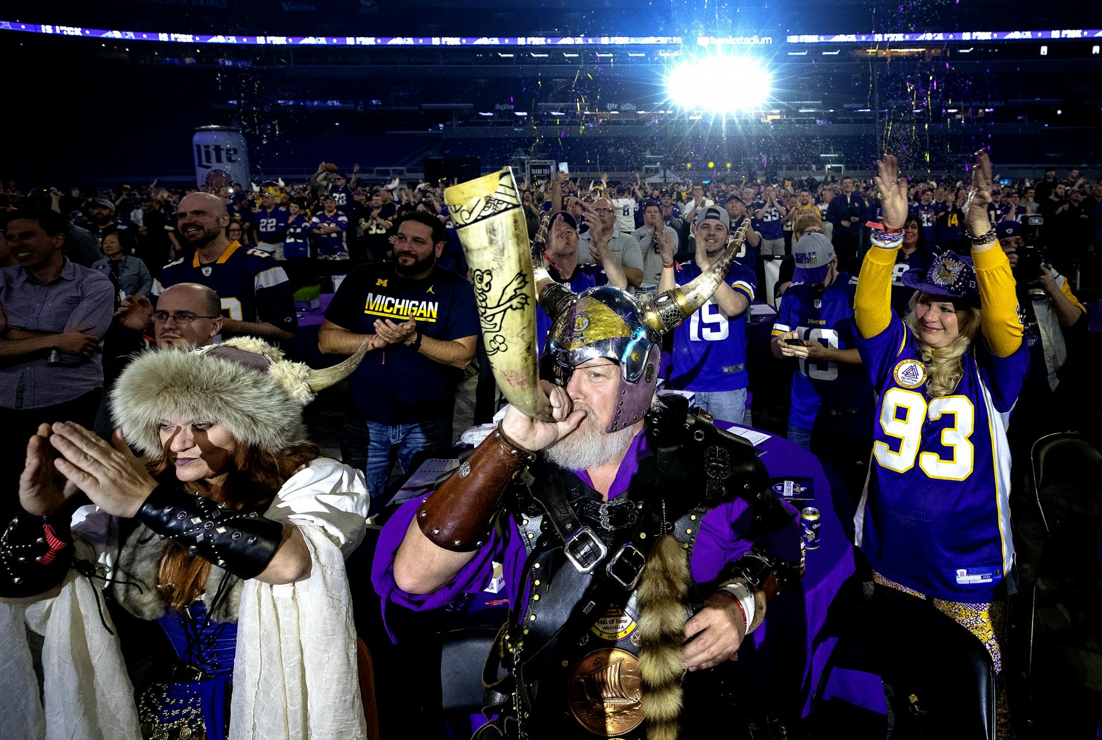 Teri "Freyja" Hanson and Greg "Sir Odin" Hanson of Watkins, MN cheered after the Vikings selected Central Florida CB Mike Hughes in the first round during the Minnesota Vikings draft party held at US Bank Stadium.