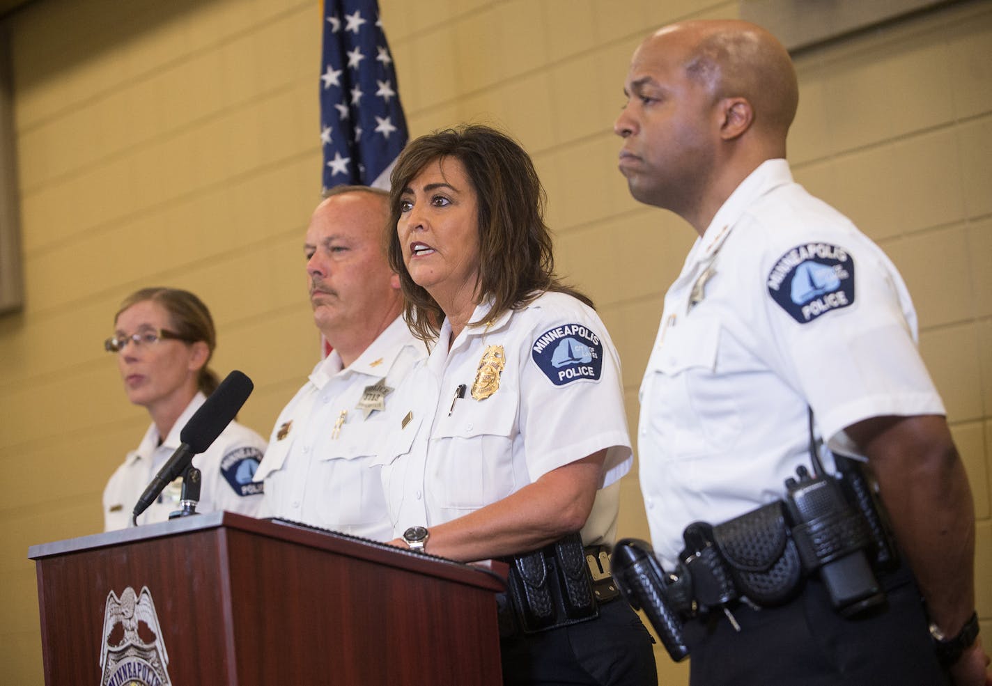 Minneapolis Police Chief Janee Harteau speaks to the media on Thursday, July 20, 2017, at the Emergency Operations Training Facility in Minneapolis. She is joined by, from left, inspector Kathy Waite, inspector Mike Kjos, and assistant Chief Medaria Arradondo. (Aaron Lavinsky/Minneapolis Star Tribune/TNS) ORG XMIT: 1206846 ORG XMIT: MIN1707202040404146