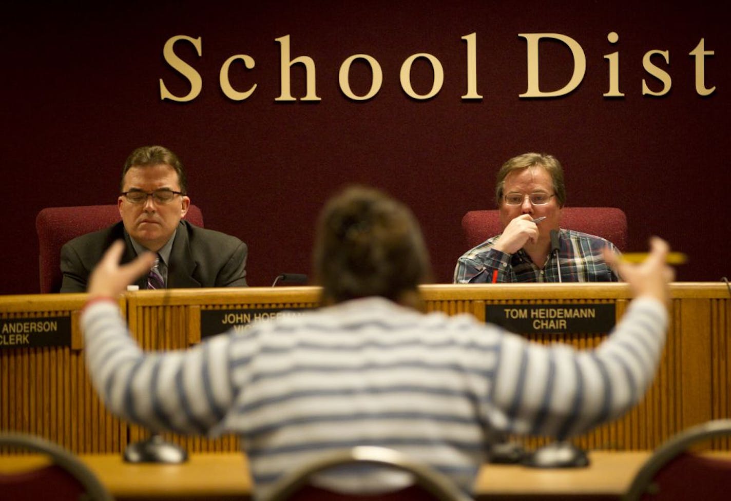 Cherie Cullum told school board members on Monday night that she wished the sides would come together. The veneer of civility before the vote was thin but remained intact during the 90 minutes of debate. Some comments drew gasps from the audience.