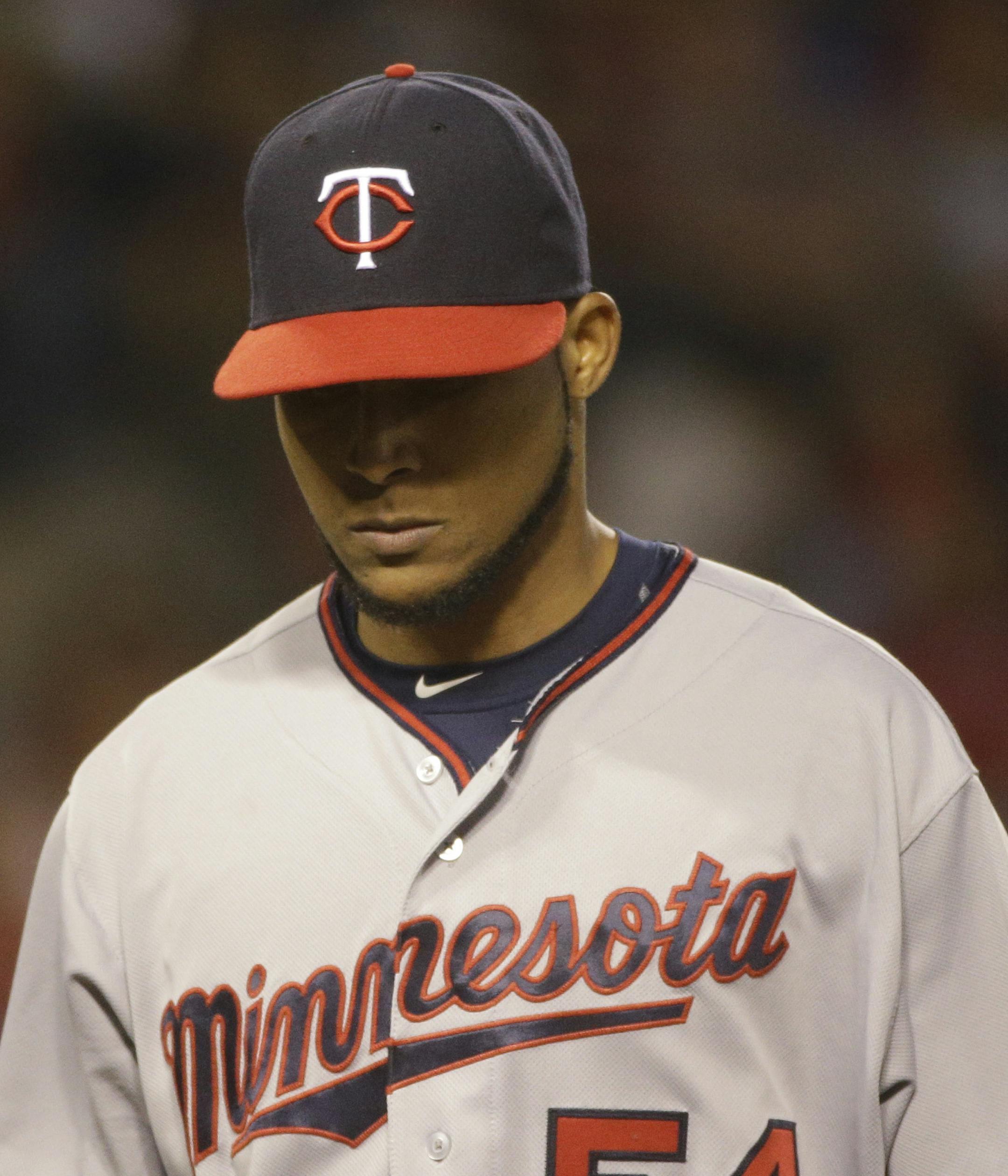 Minnesota Twins starting pitcher Ervin Santana walks off the field after the bottom of the fourth inning of a baseball game against the Los Angeles Angels, Tuesday, June 14, 2016, in Anaheim, Calif. (AP Photo/Jae C. Hong)