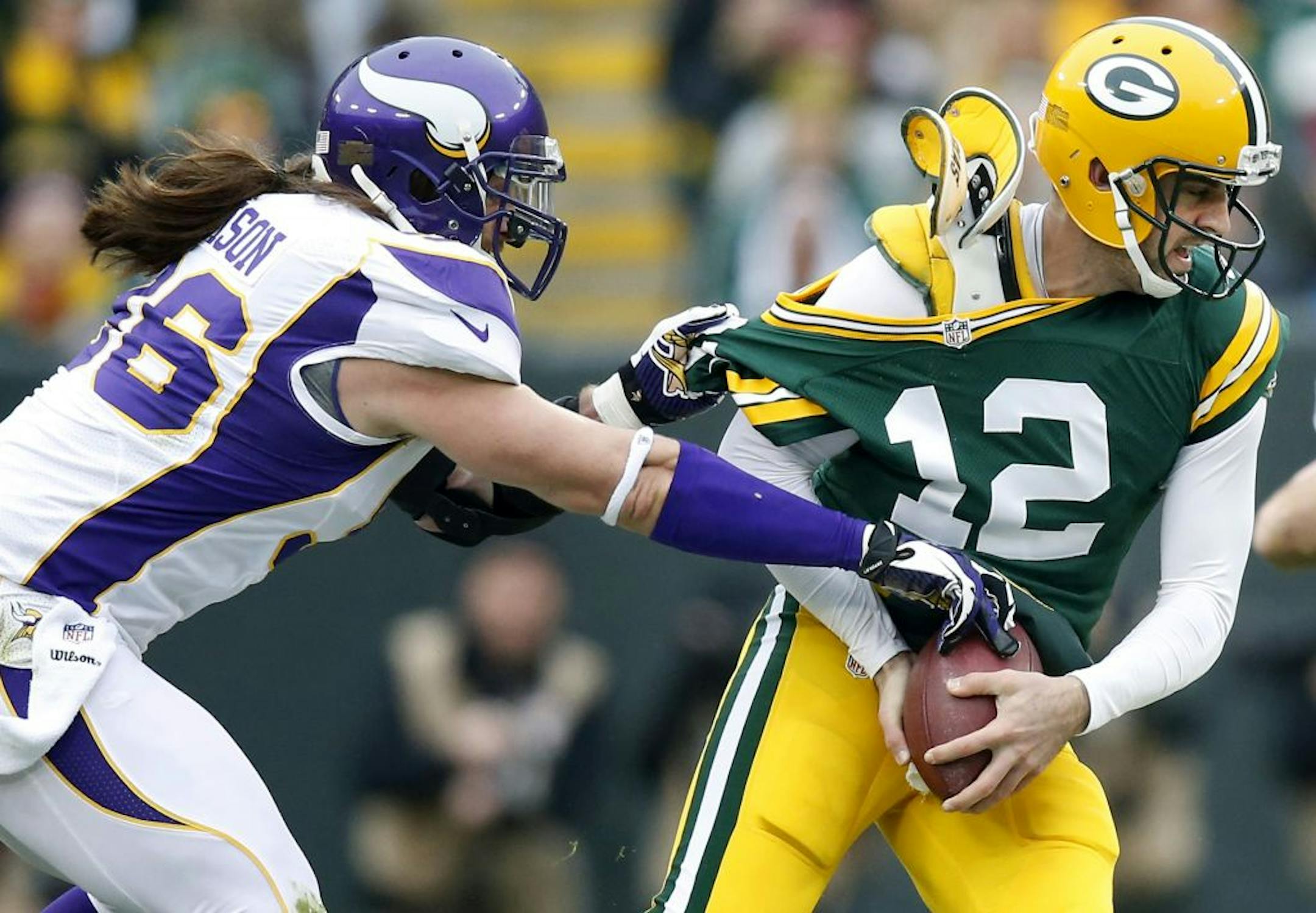 Brian Robison pressured Green Bay quarterback Aaron Rodgers on this play but didn't get a sack all game.