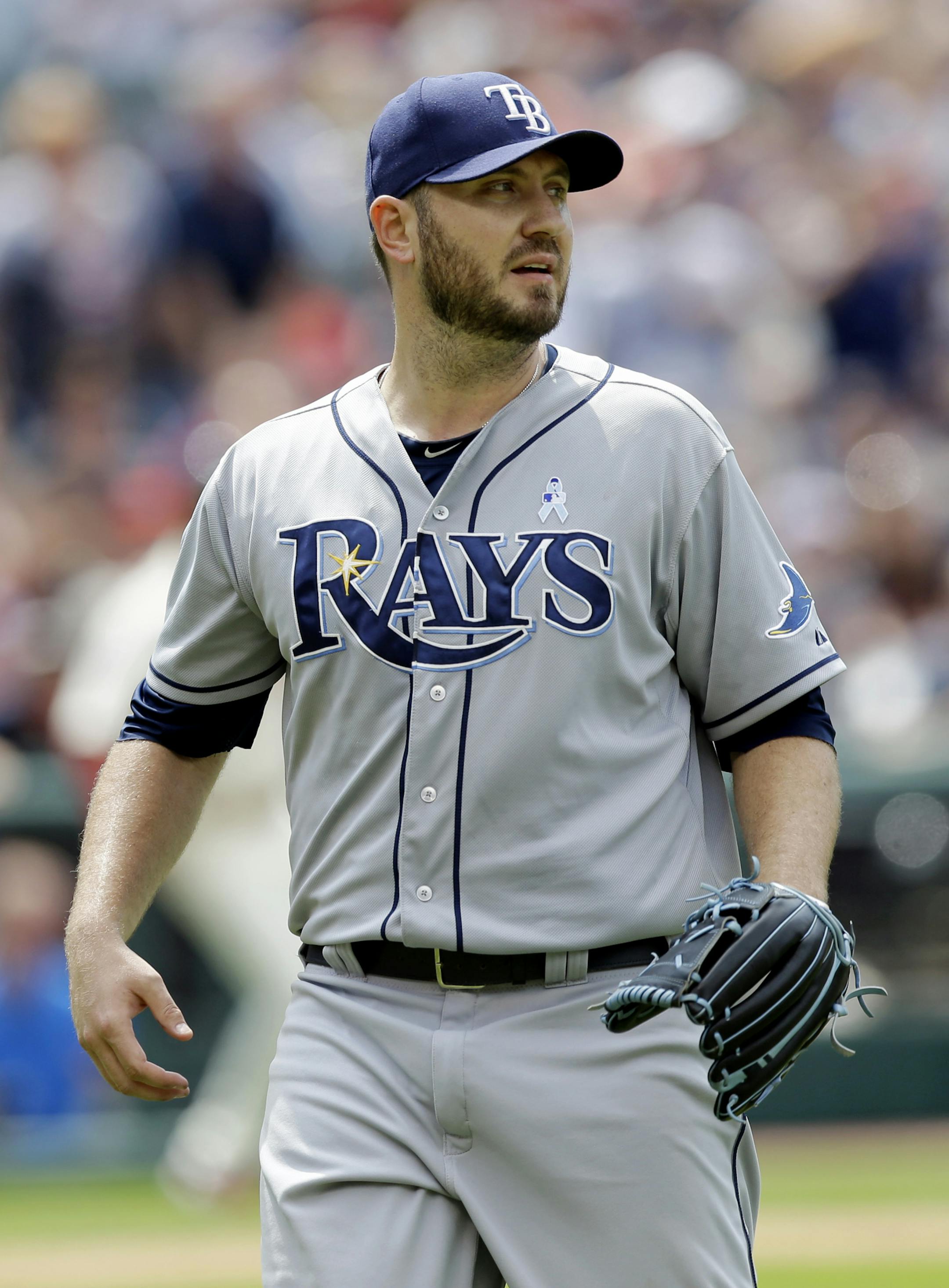 Tampa Bay Rays relief pitcher Kevin Jepsen watches a single hit by Cleveland Indiansí Jason Kipnis in the ninth inning of a baseball game, Sunday, June 21, 2015, in Cleveland. Jepsen gave up the game-winning sacrifice fly hit by David Murphy which scored Roberto Perez in the ninth inning. The Indians won 1-0. (AP Photo/Tony Dejak) ORG XMIT: OHTD113