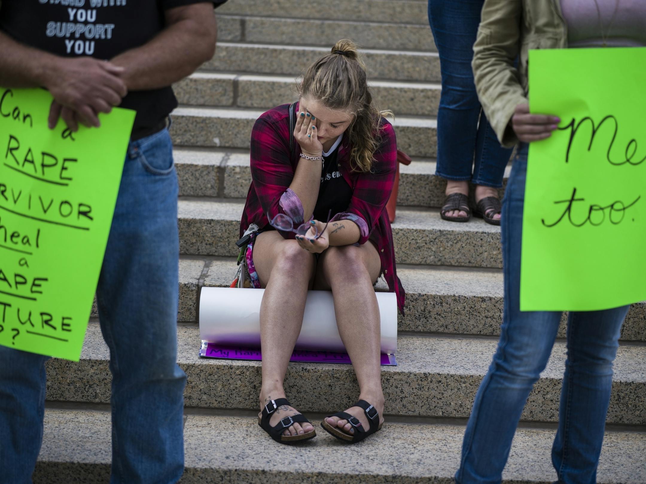 Sarah Kaleigh Seifert,21, who spoke of her rape by an acquaintance gathered herself while listening to other survivors.