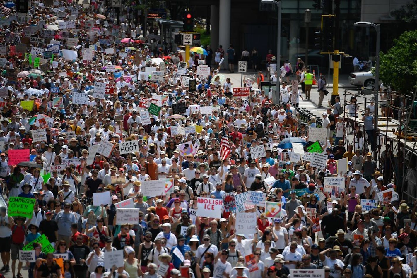 Thousands marched through downtown Minneapolis on Saturday against the Trump administration's immigration policies.