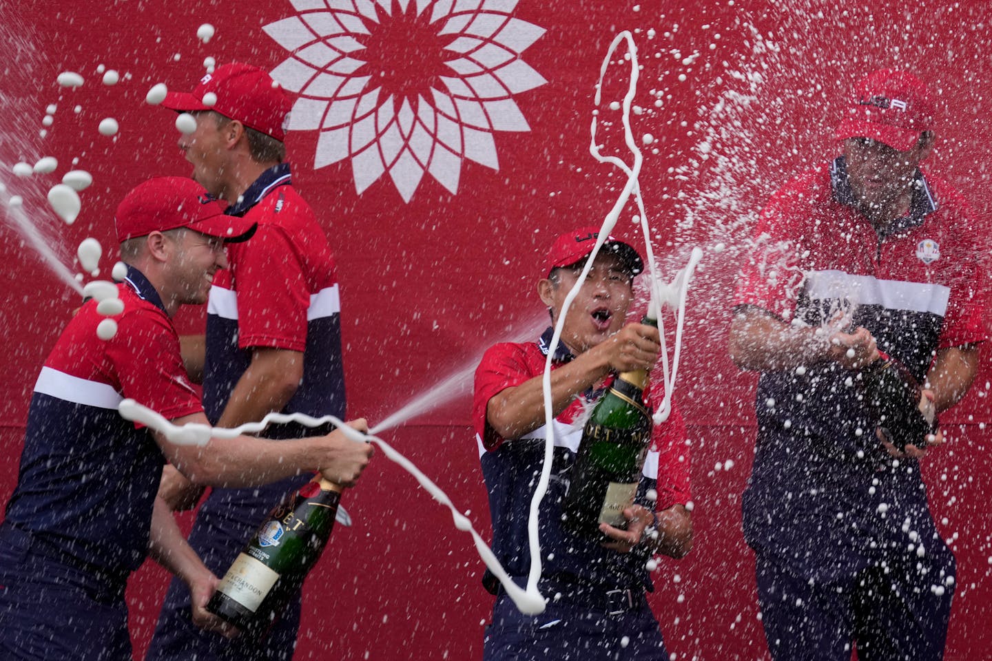 Team USA players celebrate after the Ryder Cup matches at the Whistling Straits Golf Course Sunday, Sept. 26, 2021, in Sheboygan, Wis. (AP Photo/Ashley Landis)