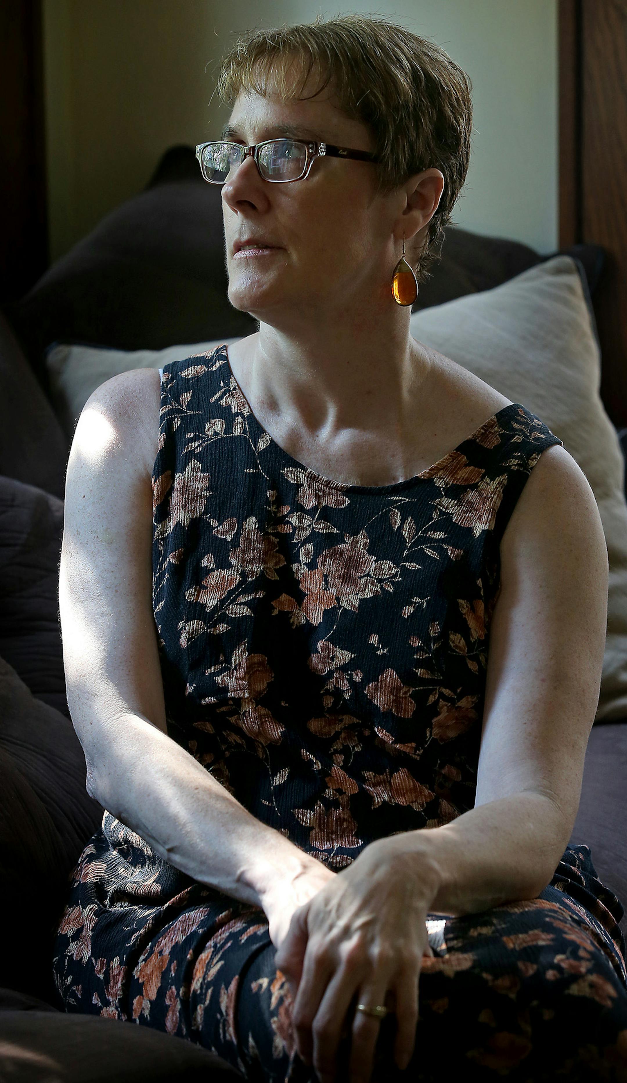 Jackie Hunt-Christensen, who has Parkinson's disease and also has struggled with depression since childhood, has been a national advocate regarding Parkinson's disease, but lately her ability to travel and her mobility has decreased due to Parkinson's symptoms. Here Hunt-Christensen is photographed in her south Minneapolis home, Wednesday, August 20, 2014. She said her grandmother committed suicide when Hunt-Christensen was 5-years-old. ] (ELIZABETH FLORES/STAR TRIBUNE) ELIZABETH FLORES •