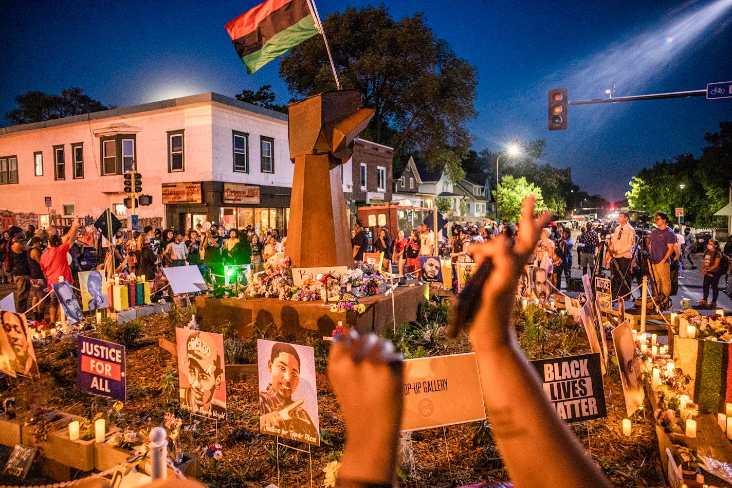 In Minneapolis, MN on May 25, 2021, at George Floyd Square on the anniversary of his murder, a candlelight vigil was held in his honor.] RICHARD TSONG-TAATARII ¥ Richard.Tsong-Taatarii@startribune.com