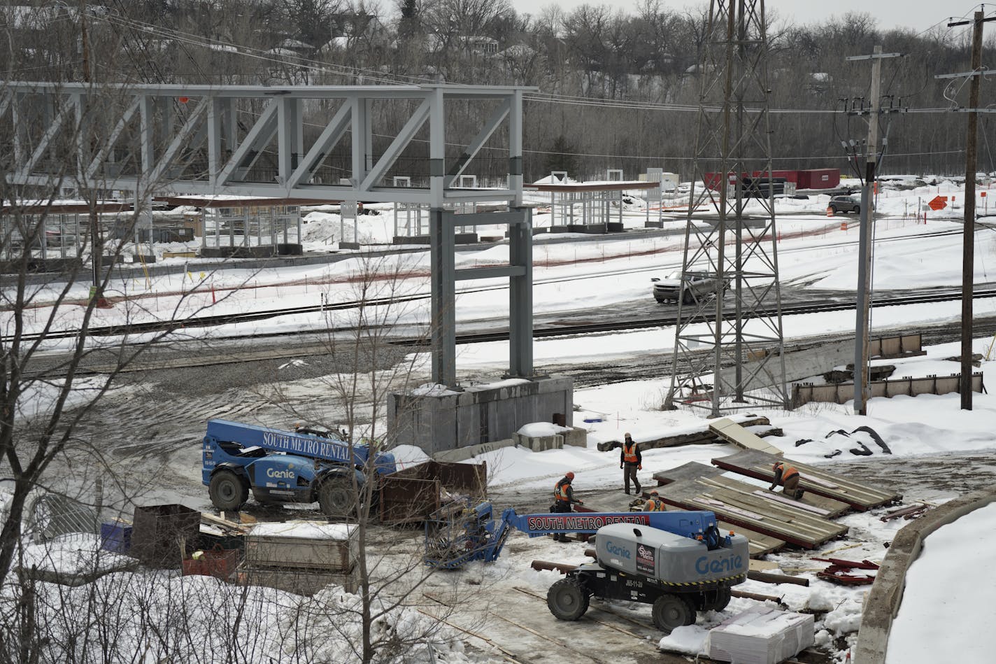 Work at the Green Line Bryn Mawr Station continues Wednesday, March 15, 2023 in Minneapolis, Minn. The station will be connectedÊto Penn Avenue South and Wayzata Boulevard by an elevated, enclosed pedestrian bridge. The state's Legislative Auditor is slated to release the first of two reports probing Southwest light rail's cost overruns and delays. ] Brian Peterson ¥ brian.peterson@startribune.com