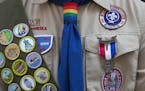 FILE -- Eagle Scout Pascal Tessier, who is openly gay, in the annual Gay Pride March in New York, June 29, 2014. Reversing its stance of more than a c