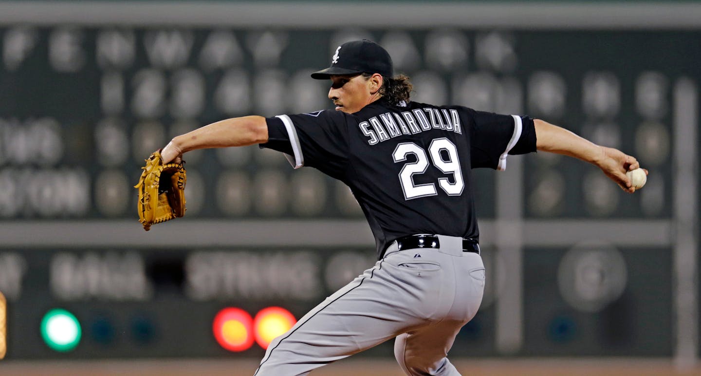 Chicago White Sox starting pitcher Jeff Samardzija delivers during the ninth inning of a baseball game against the Boston Red Sox at Fenway Park in Boston, Tuesday, July 28, 2015. (AP Photo/Charles Krupa)