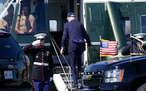 President Joe Biden boards Marine One in Rehoboth Beach, Del., heading back to the White House in Washington a day earlier than planned, on Saturday,