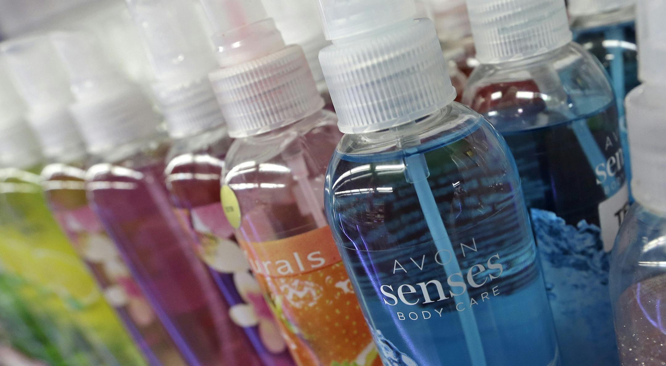 This Tuesday, June 20, 2017, photo shows Avon body products displayed at a store in Hialeah, Fla. Avon CEO Sheri McCoy will leave the company in March 2018 as the struggling beauty products maker continues a turnaround campaign. Avon said Thursday, Aug. 3, that it has hired an executive search firm to help find McCoy's successor. (AP Photo/Alan Diaz)