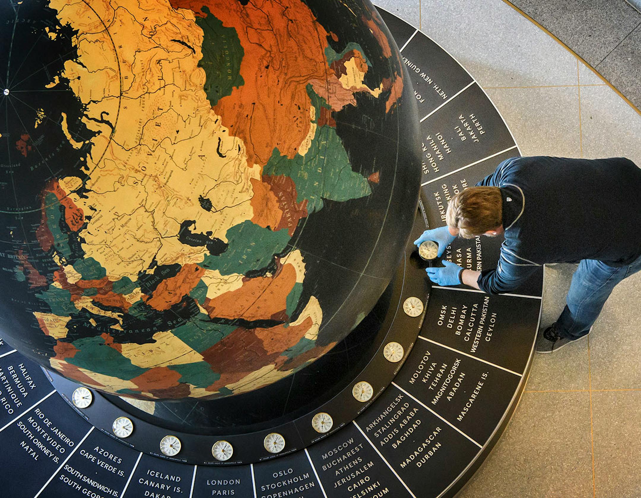Tim Quady owner of Blue Rhino Studio in Eagan placed the 24-hour clocks around the globe.