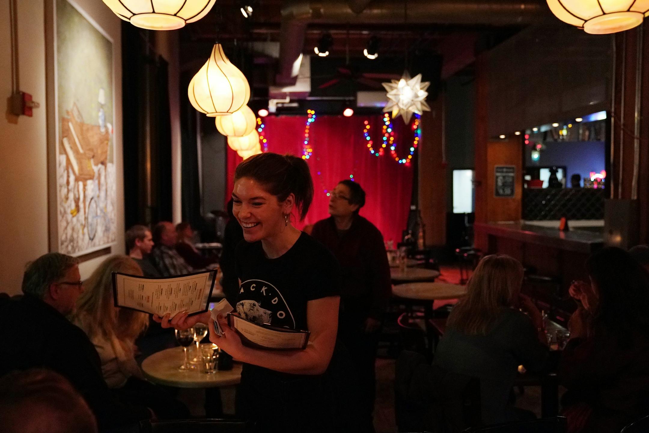 Server Eva Krohnfeldt took a table's order Saturday evening at the Black Dog Cafe.