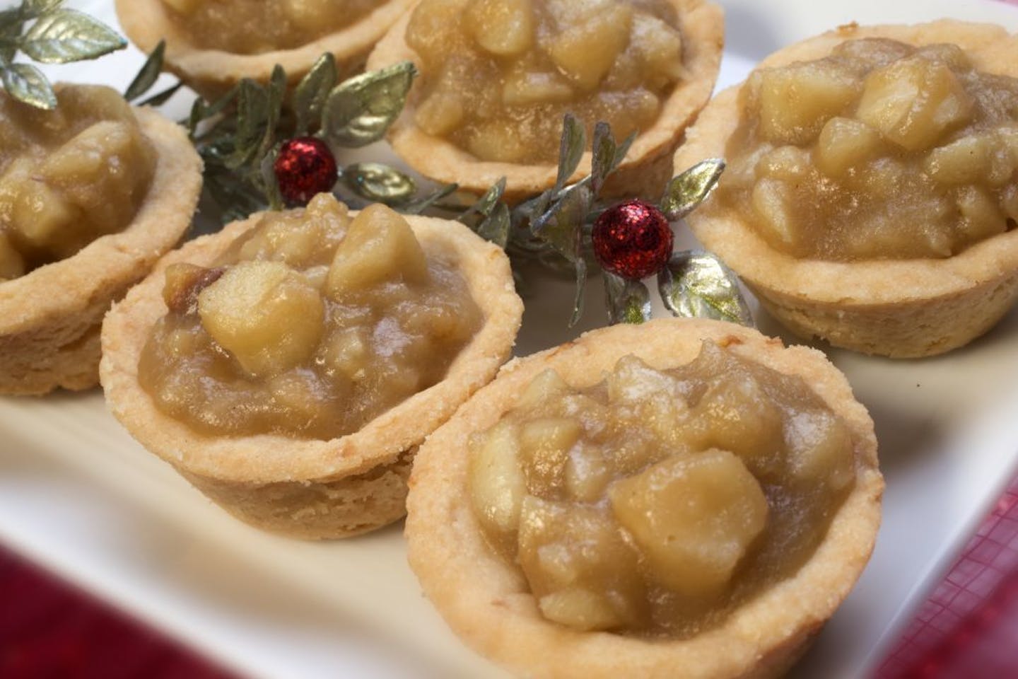 Caption for cookies: The 2014 Taste holiday cookie contest winners include: Italian Almond Cookies, Tart & Sassy Cranberry Lemon Drops; Chocolate Thumbprints; Macadamia Nut Tarts and Espresso-Hazelnut Truffle Cookies. The annual Star Tribune cooky contest